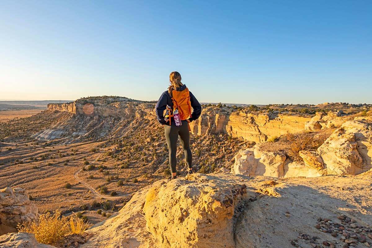 An SJC student taking in the views on top of a mesa